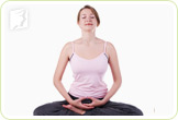 Woman in a yoga pose: yoga can help to reduce stress and control loss of libido